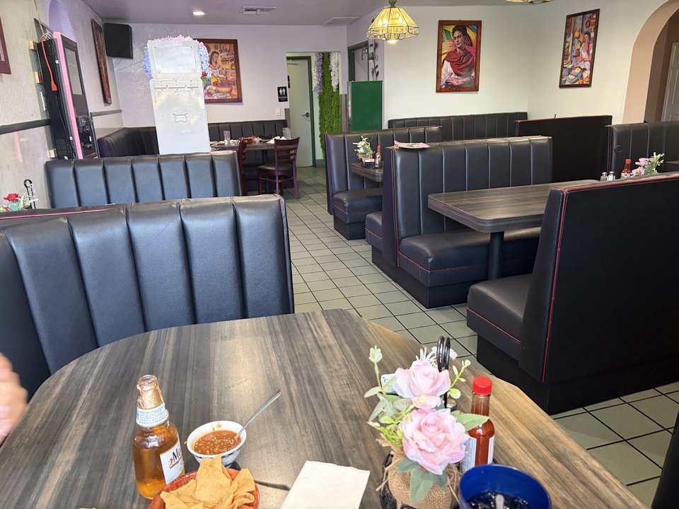 Casual dining room with booth seating.