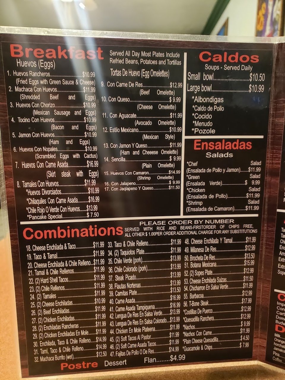 Printed menu beside a drink selection.